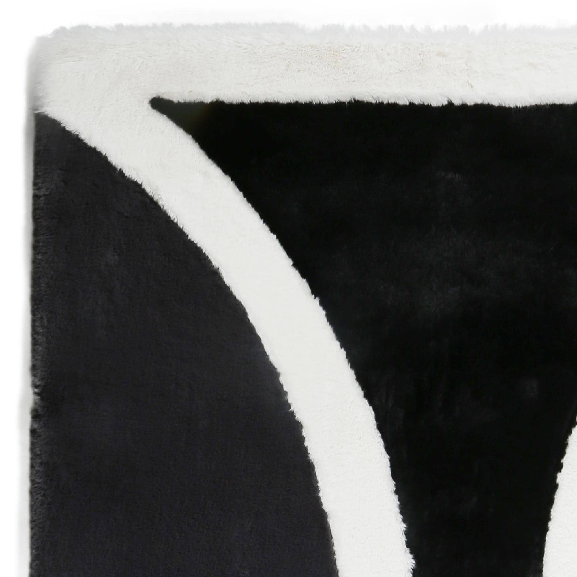 Black and White Hourglass Shaped Fur Plush Rug