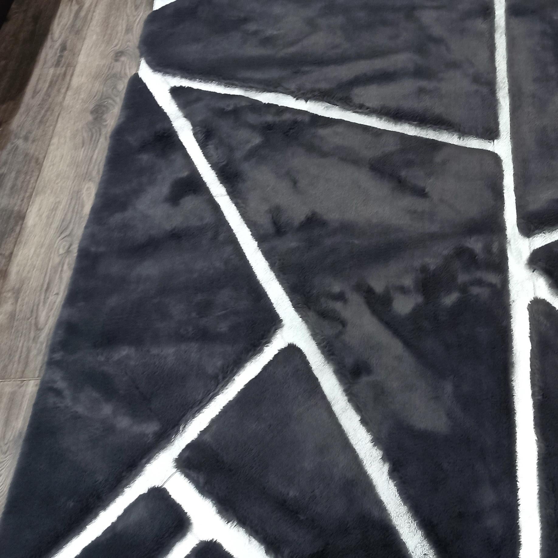 Black Plush Rug with White Geometric Lines