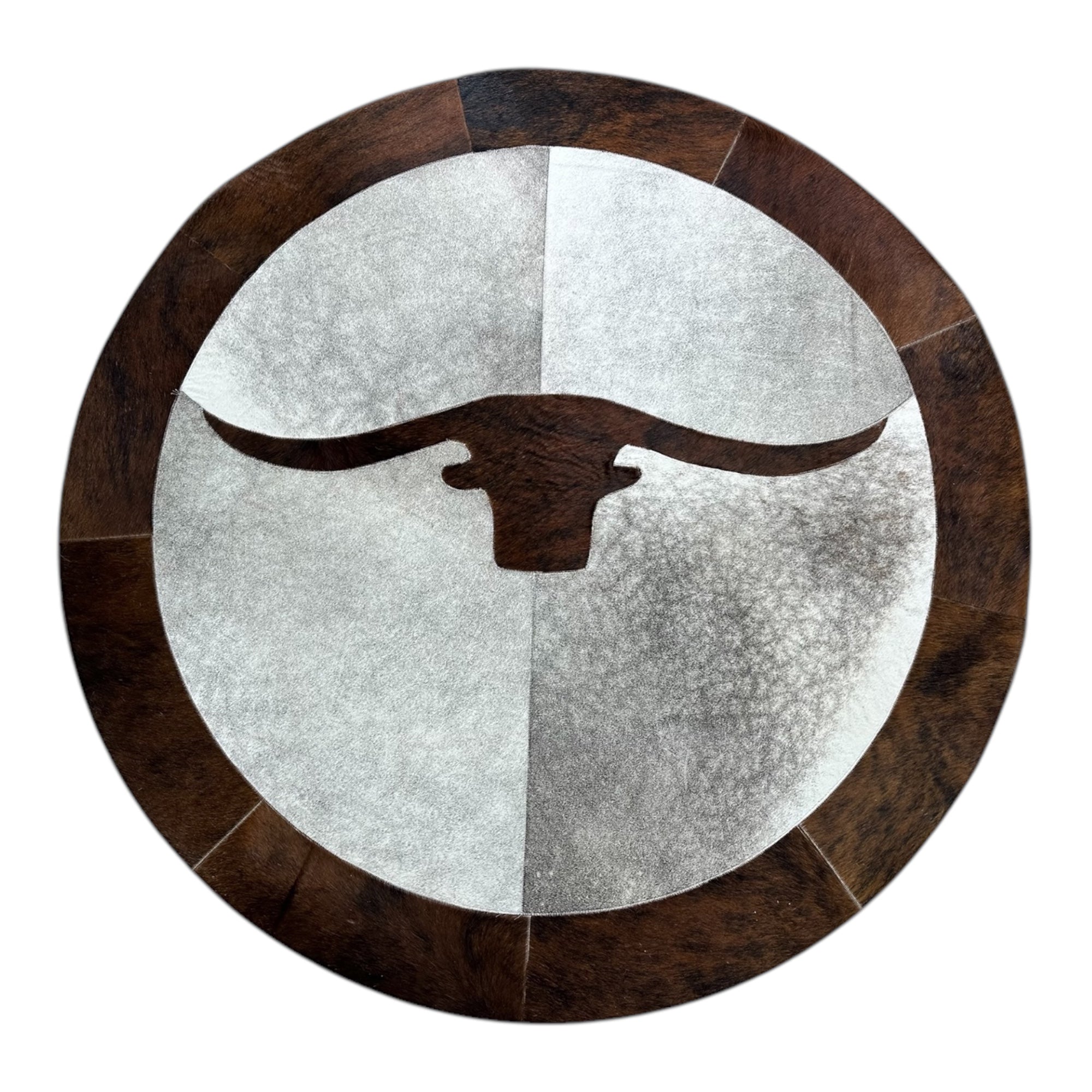 Round cowhide longhorn rug in room