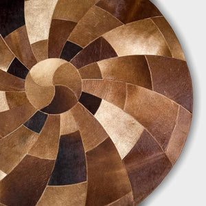 Round spiral cowhide rug detail