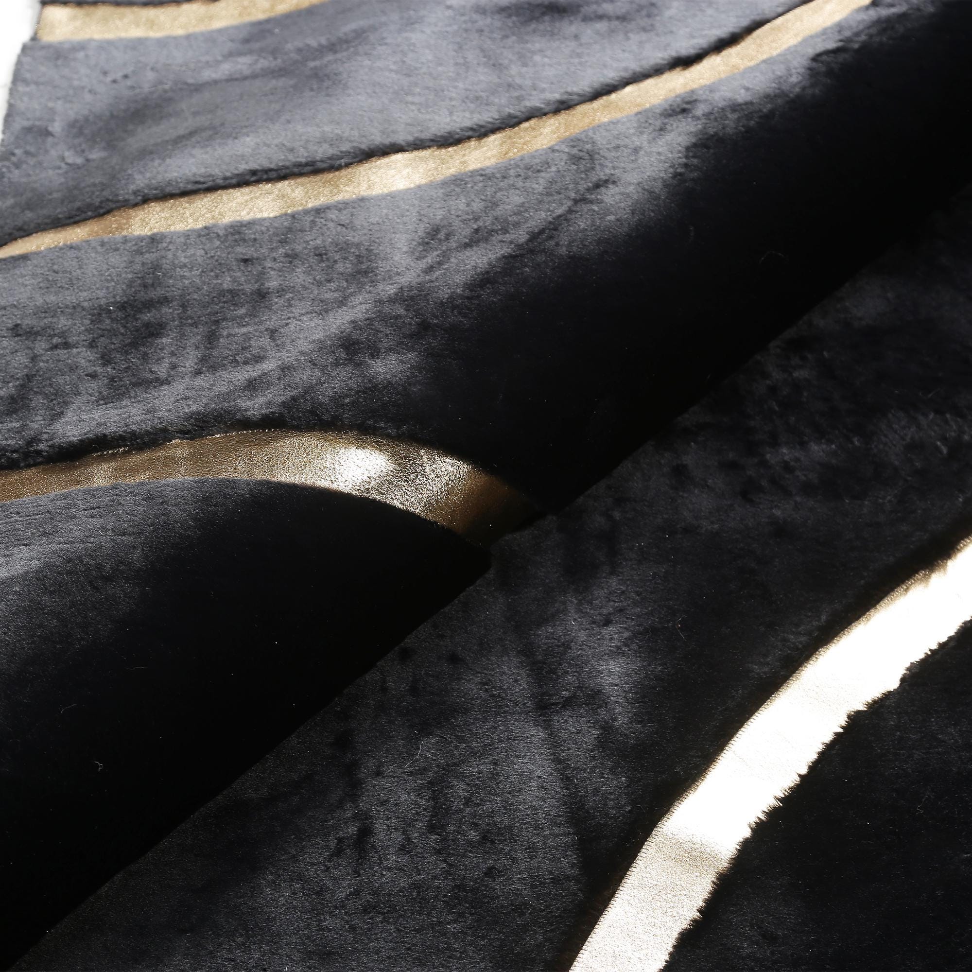 Gold striped black rug detail