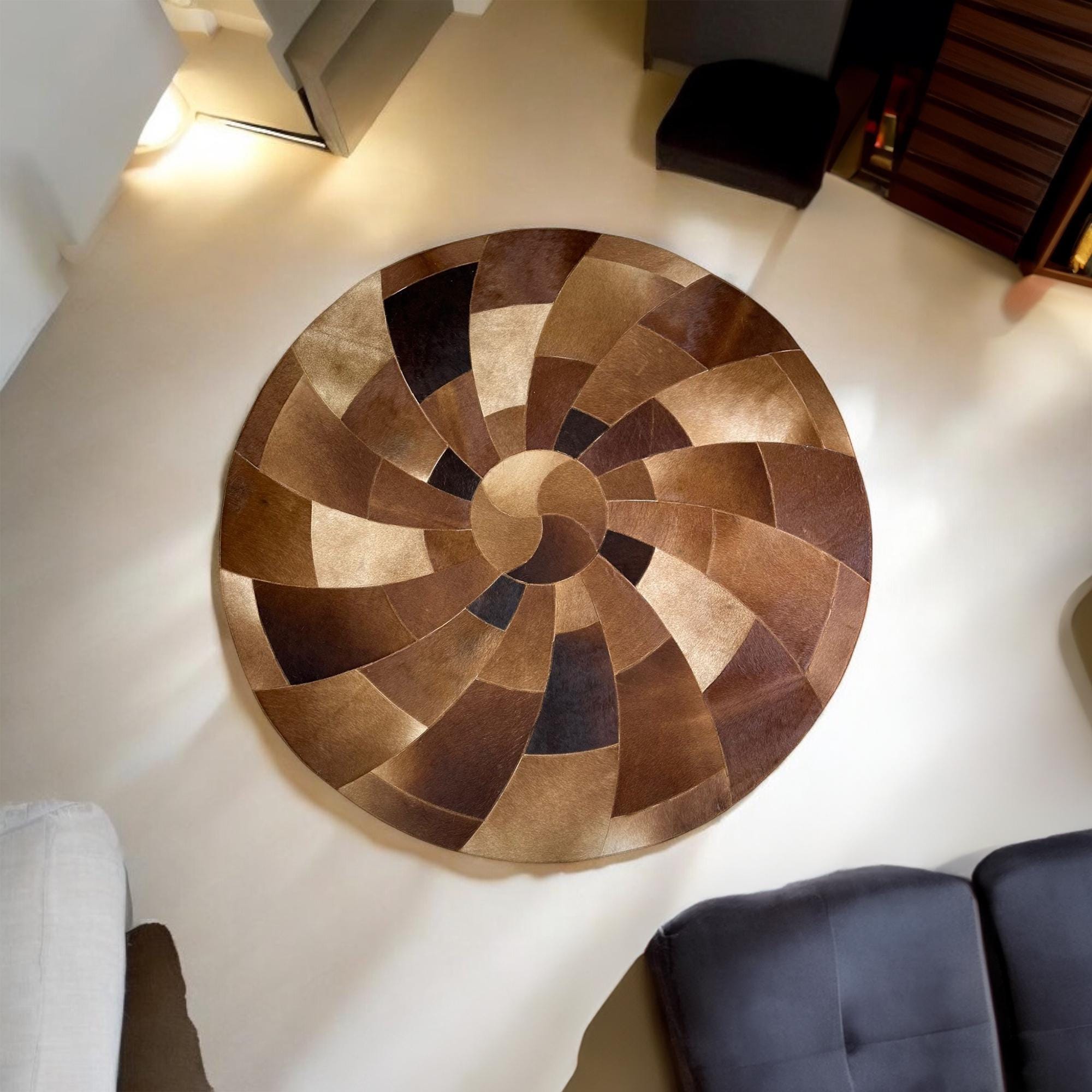 Round spiral cowhide rug in room