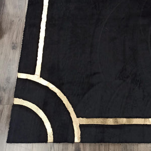 Black plush gold rug in room