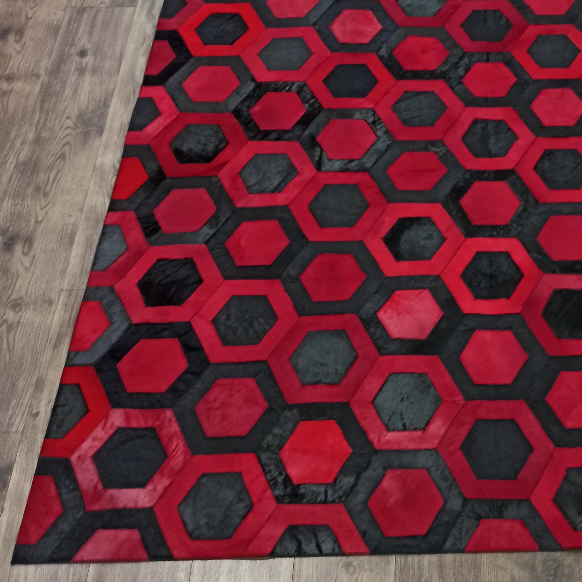 Hexagon Red Black Cowhide Rug