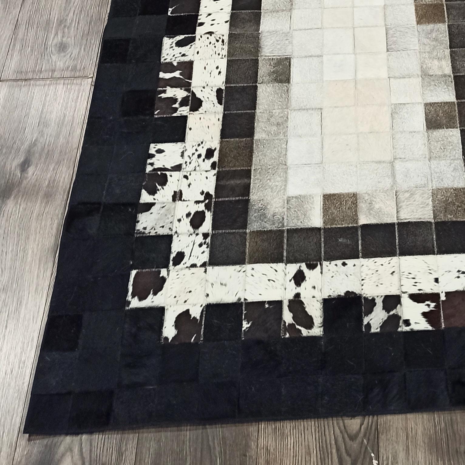 Long Black and White Cowhide Runner Rug